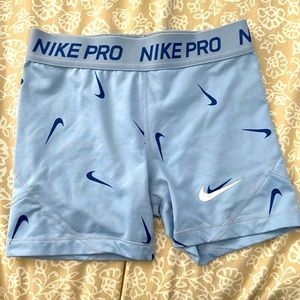 Nike pro shorts blue with dark Nike symbols